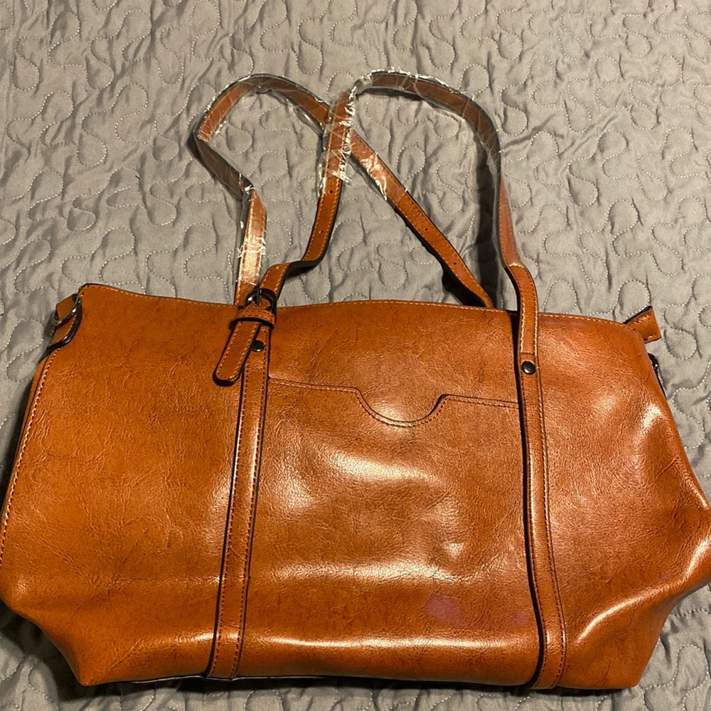 Brown leather type bag